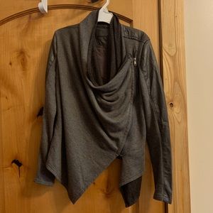 Semi-formal sweater & leather material jacket.